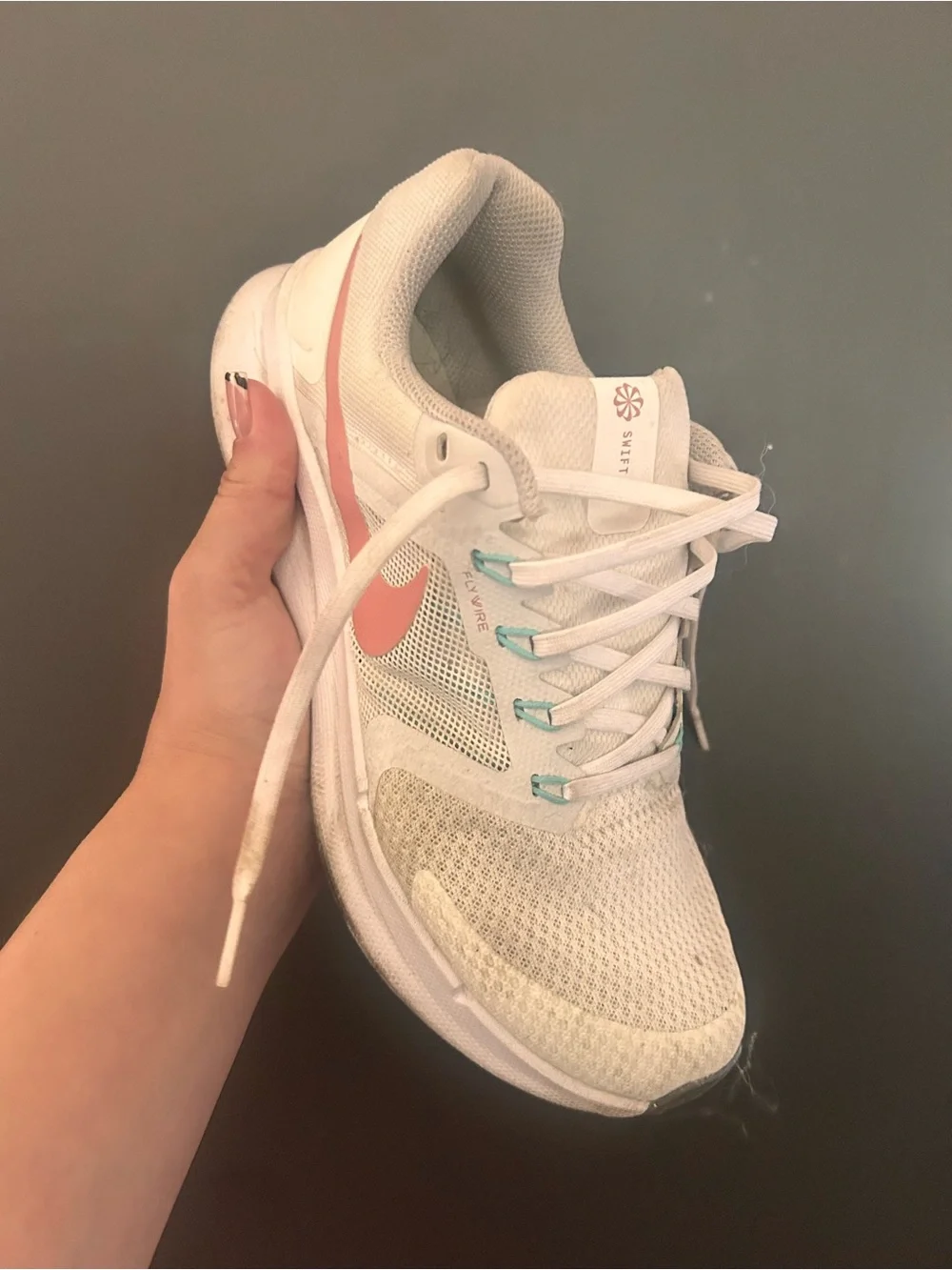 Nike Women's White Sneakers with Coral Swoosh and Teal Accents